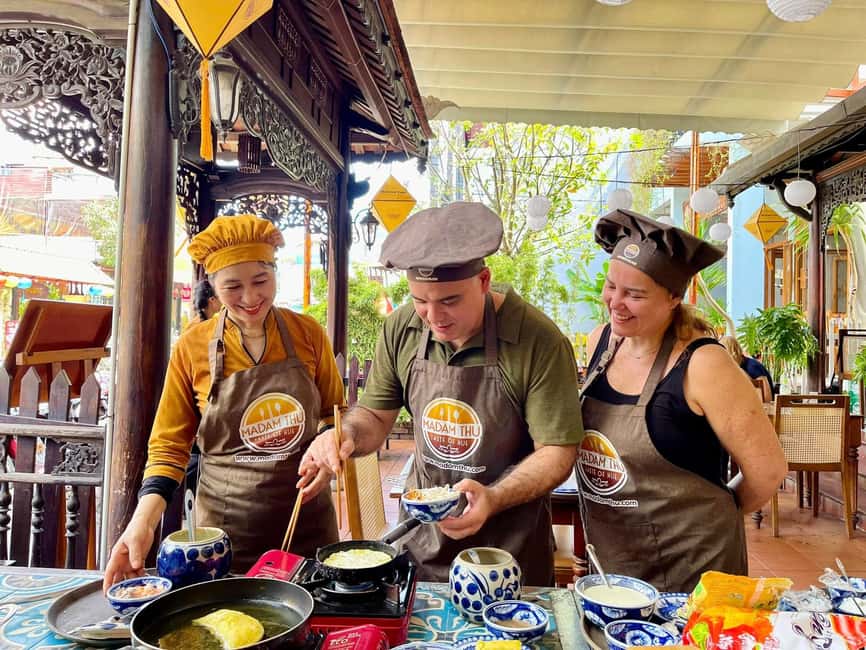 Hue City: Cyclo, Market Tour & Cooking Class at Madam Thu - The cyclo ride across the Perfume River (the short part that feels like a scene)