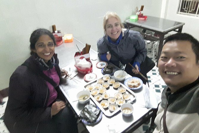 Hue Food Tour by Walking or Cyclo or Motorbike with Driver - Truong Tien Bridge snacks and a mid-route reset