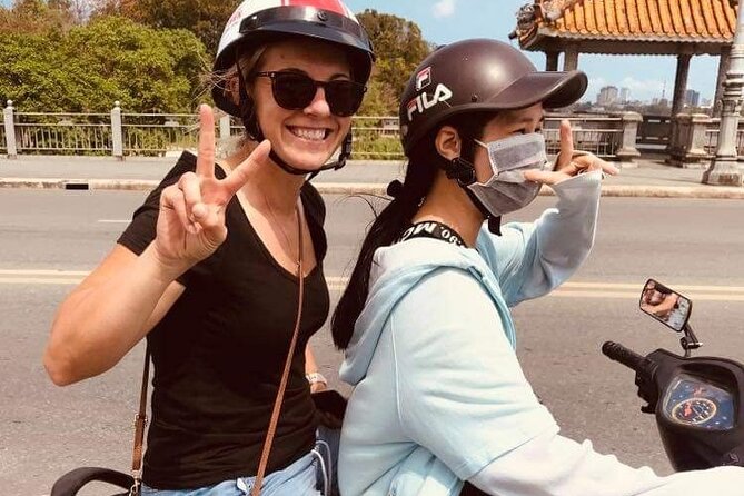 Hue Private Tour with Local Student by Motorbike - Vong Canh Hill: pine, daisies, and leftover foundations