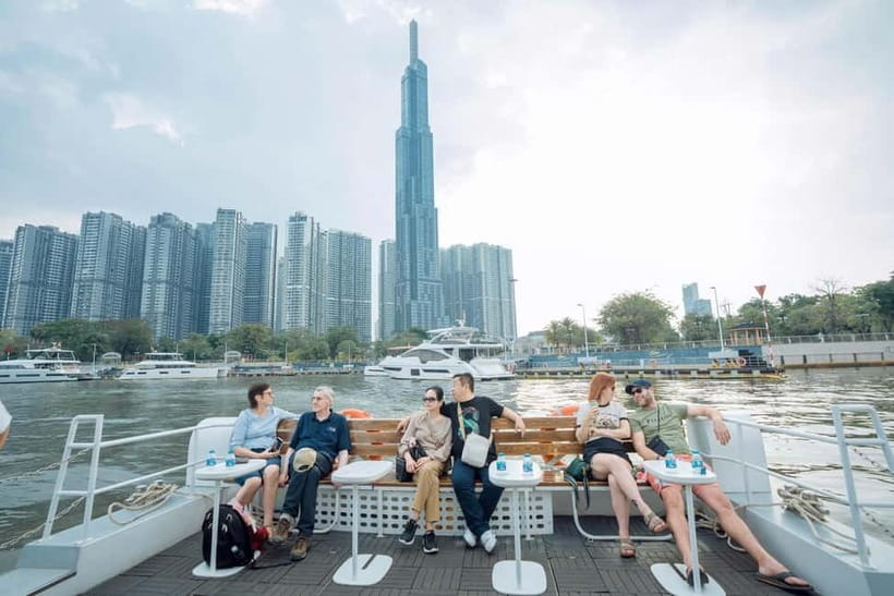 Lively Saigon River Sightseeing Cruise + Guided Walking Tour - Onboard Vibe: Drinks, Live Music, and That Ice Cream Moment