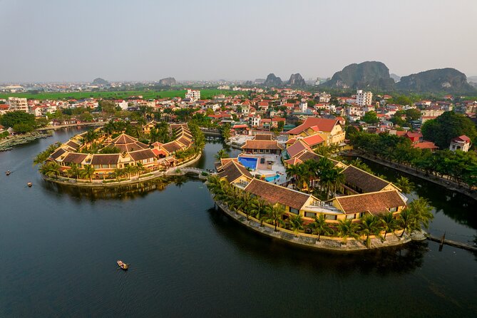 Luxury small Group Hoa Lu - Tam Coc - Mua Cave Max 6 - 8 pax/tour - Tam Coc boat ride: shared sampans, rice fields, and limestone karsts