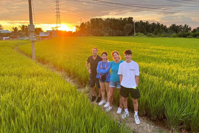 Mekong 2D1N SMALL GROUP Stay at Family Homestay WITH BBQ DINNER - The family homestay tiny garden: sunset rice fields and real downtime