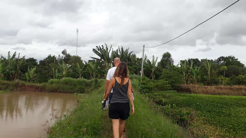 Mekong Day Tour by Car:Cai Be market, Local Island & Cycling - The canal sampan ride: the quieter side of the Delta