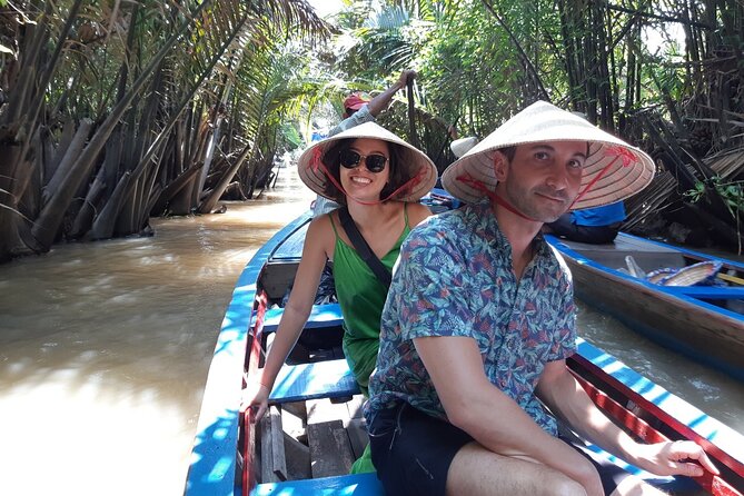 Mekong Delta Full Day Trip - My Tho & Ben Tre - Small Group Tour - My Tho by boat: islands, folk music, fruit, and possible python photos