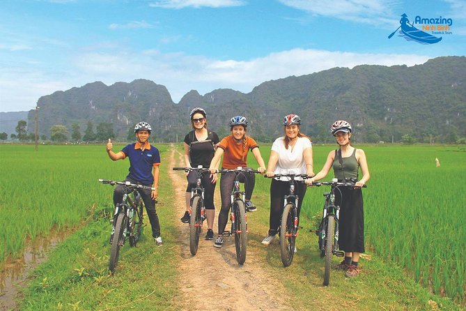 Mua Cave - Tam Coc - Bich Dong Day tour with transfer, local family & bike - Getting picked up, then getting out of Hanoi fast
