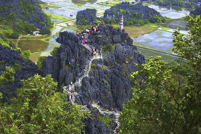 Ninh Binh 1 Day Bai Dinh Trang An Mua Cave Small Group Tour - Trang An UNESCO karst caves by boat: calm water, big formations, hidden turns