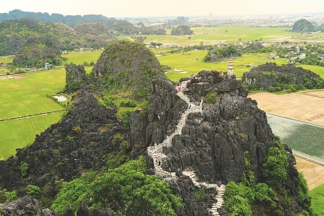 Ninh Binh 1 day Hoa Lu Trang An with Dragon Mountain Hiking - The heart of the day: Hoa Lu, Trang An, and Mua Cave