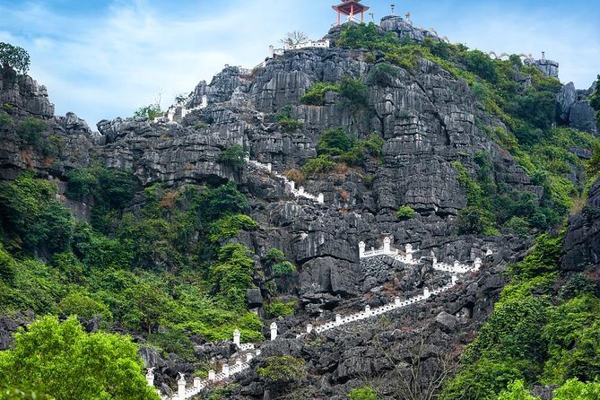 Ninh Binh Daily Tour: Hoa Lu -Mua Cave -Tam Coc- Bike-Swimming with Sunset Party - Tam Coc sampan boat ride through rice fields and limestone mountains