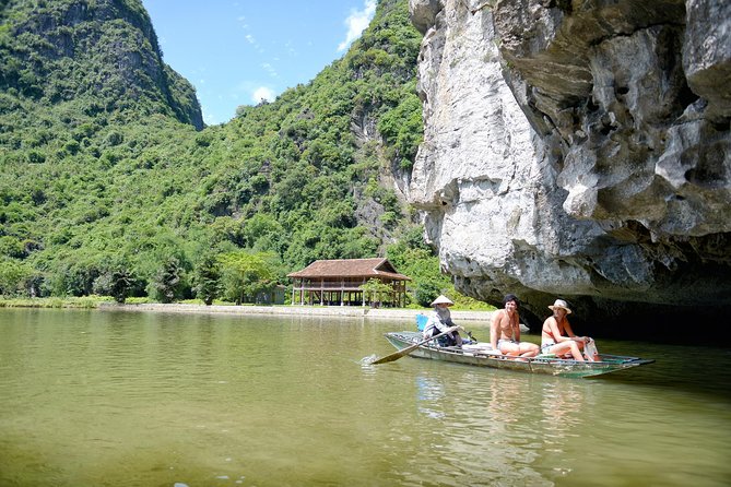 Ninh Binh Daily Tour: Hoa Lu - Tam Coc boat trip and Bike - Tam Coc Sampan on Ngo Dong River, Three Cave Passages
