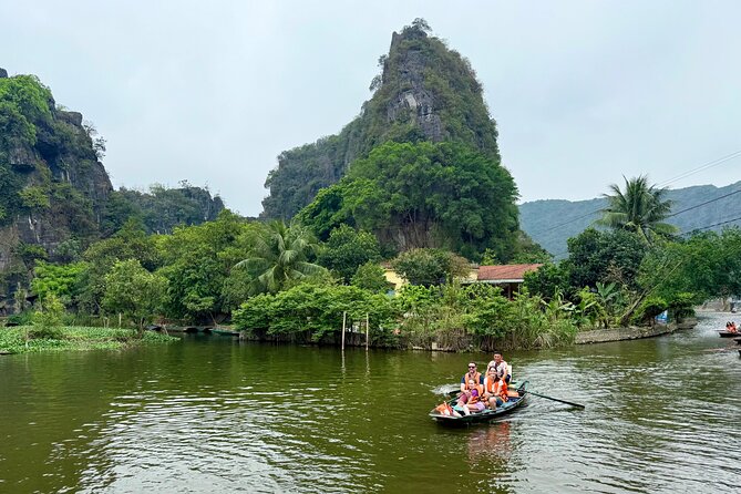 Ninh Binh Day Escape from Hanoi: Local Life, Connection & Tales - Tam Cốc by sampan boat: rice paddies and limestone from water level
