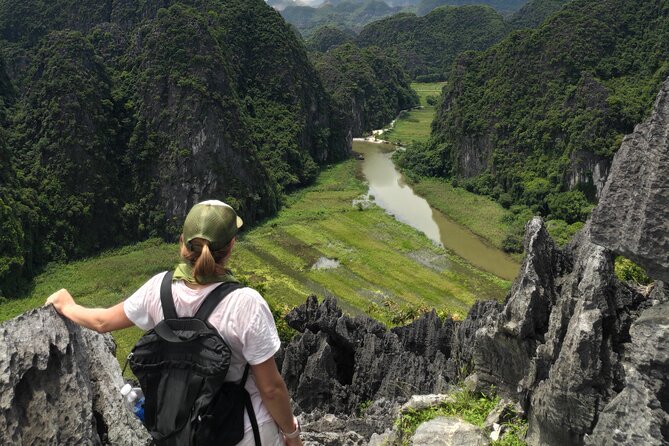 Ninh Binh Full-Day Small Group of 9 Guided Tour from Hanoi - Easy cycling by rice fields near limestone peaks