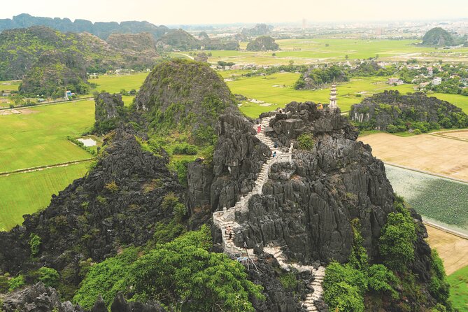 Ninh Binh Full-Day Small Group of 9 Guided Tour from Hanoi - Tam Coc sampan ride: caves on calm water