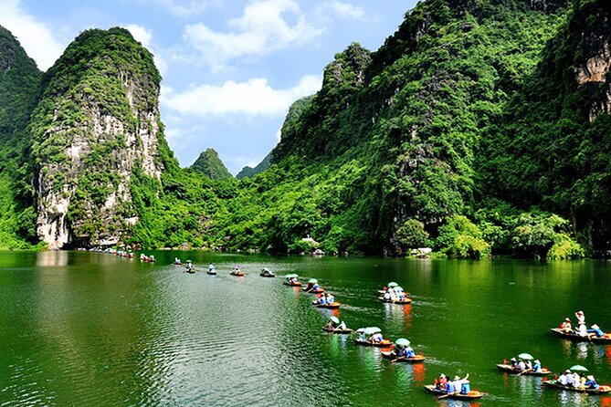 Ninh Binh Full Day Tour Group 8 (Trang An- Bich Dong- Mua cave) - Cycling through rice fields and a local family visit near Tam Coc