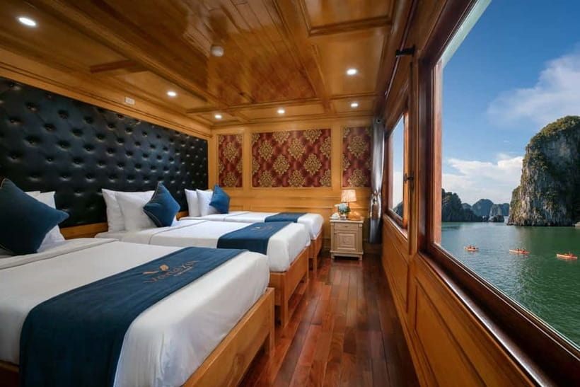 Ninh Binh: Lan Ha Bay 2D 1N cruises- bike tour, kayak, meals - Day 2: Viet Hai Village by bicycle, rainforest tunnel, and a later return to Hanoi