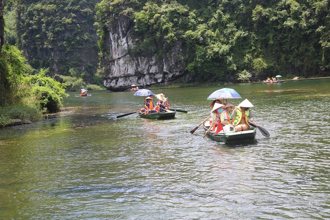 Ninh Binh Luxury Tour 2 Days 1 night by limousine See Hidden Gems - Mua Cave steps and the view from Ngoa Long Mountain