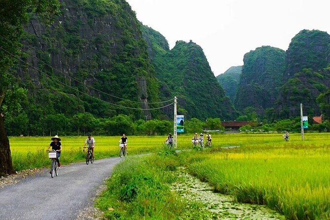 Ninh Binh Tour: Deluxe & Small Group Tam Coc Hoa Lu - Boat, Biking, Buffet Lunch - Tam Coc and the Flooded Caves Boat Ride That People Remember