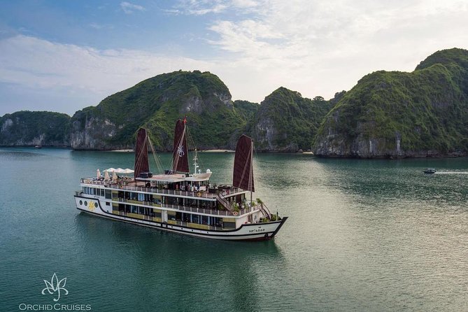 Orchid Cruise Halong Bay 3Days 2Night on 5 Star Cruise - Cabins and dining: balcony views, big windows, and real comfort