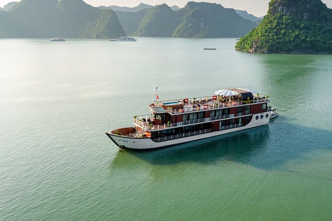 Orchid Premium Cruises Halong Bay 2Days/1Night With 5 Star - Day 1: Pickup in Hanoi Old Quarter, then Tuan Chau to the ship