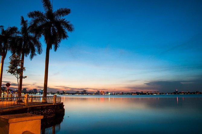 Private Hanoi Motorbike Sightseeing and Food Tour - Old City Gate and Duờng Tau: real Hanoi street texture