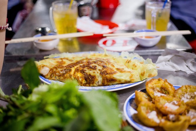 Private Street Food Motorbike Tour in Ho Chi Minh City - Stop 4, District 4 seafood set and flan to close