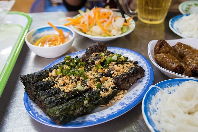 Private Street Food Tour by Motorbike in Ho Chi Minh City - Ho Thi Ky Flower Market: old Saigon character in a working place