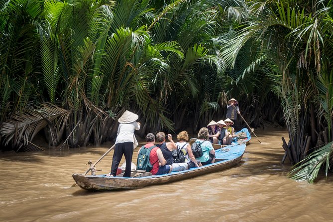 Private Tour to Explore Cu Chi Tunnels and Mekong Delta - Coconut candy, honey tea, and sampan rides in the Mekong delta