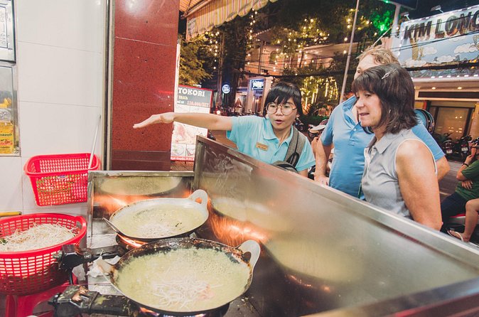 Saigon After Dark Night Tour by Scooter + 7 tastings - Ho Thi Ky flower market plus crispy banana cracker making