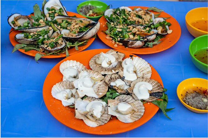Saigon After Dark With Seafood, Beer & Live Music Bar - Why this scooter-and-food night is a practical way to see Saigon