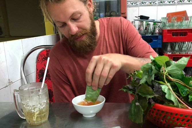Saigon By Night and Street Food By Motorbike | Opt: Ao Dai Riders - Stop 2: Ho Thị Ký Flower Market, oysters with black pepper sauce, and quail eggs