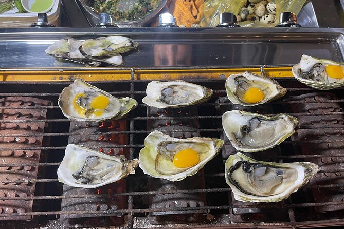 Saigon By Night and Street Food By Motorbike | Opt: Ao Dai Riders - Stop 3: Nguyễn Trãi Street shopping chaos, and a chance to digest between courses