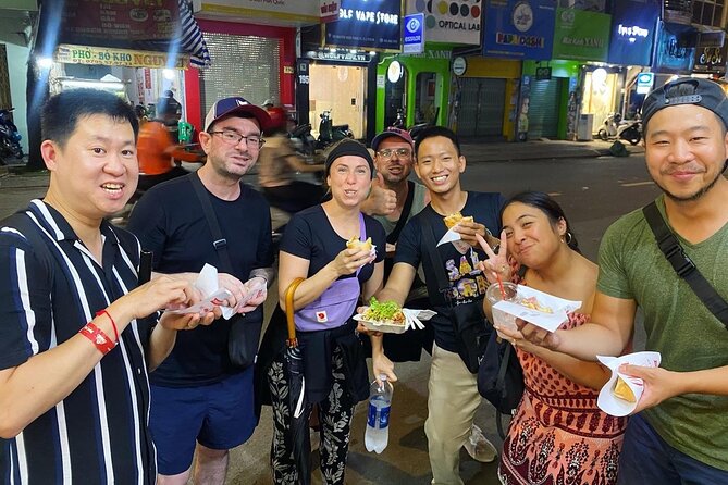 Saigon by Night: Private Street Food Walk You Can’t Miss - Vietnamese pizza, a seafood food challenge, and the fun parts of not knowing what comes next