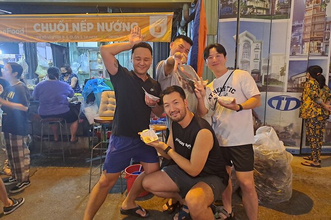 Saigon Food Tour by Scooter with Eleven Tastings - District 10 Street Food Stops: Pancakes, Beef in Betel Leaf, Bao Buns, and More
