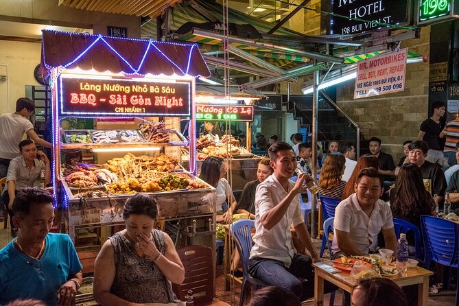 Saigon Night Bites on Foot: Local Vendors, Stories & Sweet Finish - Beer, peanuts, rice crackers, and the flan finale