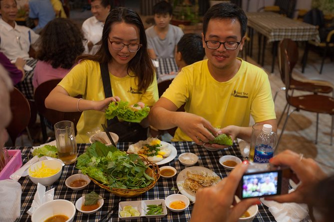 Saigon Night Street Food and City Tour on Scooter - The guides: why English and careful riding matter