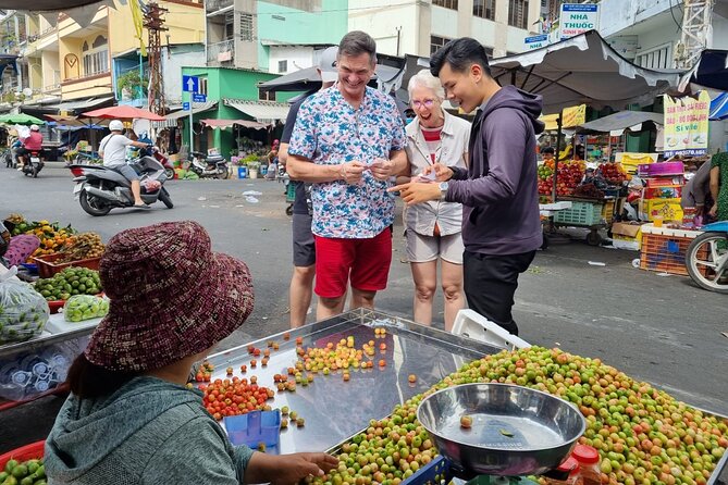 Saigon Private/Small Group Walking Food Tour with 13 Tastings - District 5 finish in the evening light: bánh mì and dessert