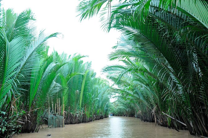 Small-Group Authentic Mekong Delta Day Trip from Ho Chi Minh City - Sampan Canals and a Short Bike Ride Through Farm Fields