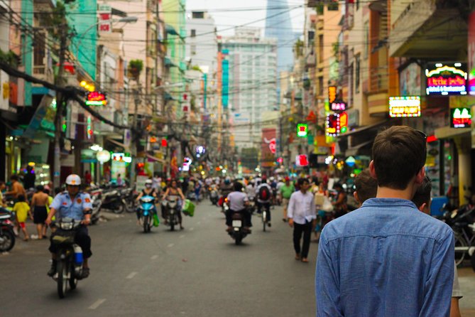 Small group Saigon Inside Out by Motorbike for 3 Hours - Busiest tourist market to flower chaos: how the early stops set the tone