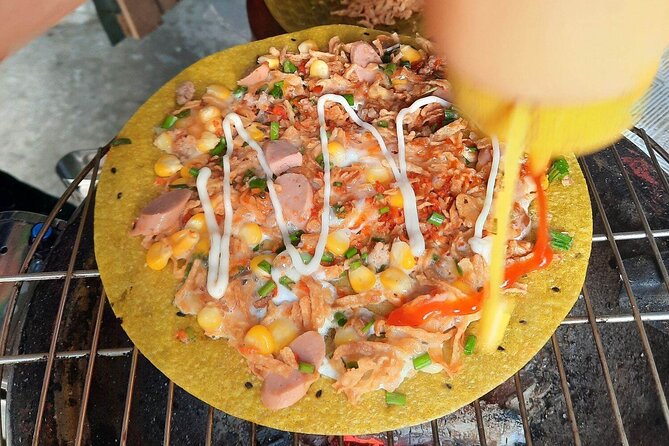 Super Niche Walking Street Food Tour in Ho Chi Minh City - Walking, Taxis, and Getting Through Crazy Street Traffic Safely