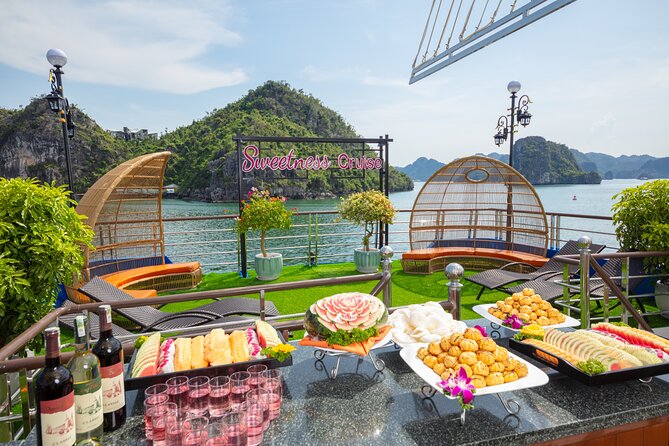 Sweetness Cruise Ha Long Bay: Caves, Kayaking, Swimming & Lunch - Sung Sot Cave Walk, Stalactites and Stalagmites Up Close