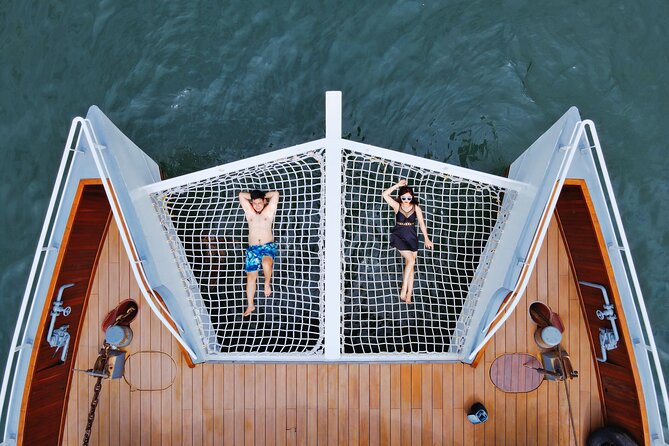 The Halong Catamaran Premium Day Cruise From Ha Long Bay - Service you can feel: English guidance and friendly faces on board