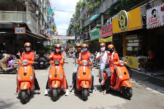 The Insider's Saigon With Female Ao Dai Riders Vespa 4,5 Hours - Cholon and Thien Hau Pagoda, where culture becomes a street scene
