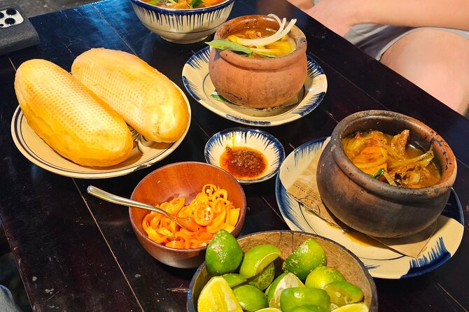 Unique Taste of Saigon Street Food Tour - Motorbike pickup, helmets, and an English-speaking guide