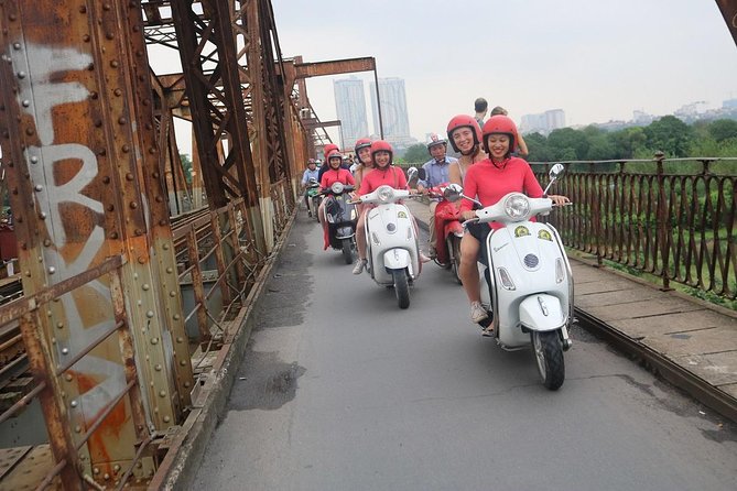 Vespa City Tour &Train Street Female With Ao Dai Riders 4,5 Hours - West Lake, Tran Quoc Pagoda, and the B-52 area you should not rush