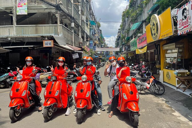 Vespa Female Ao Dai riders Night Street Food + See Train Street - Night Vespa in Hanoi, run by a female-led team