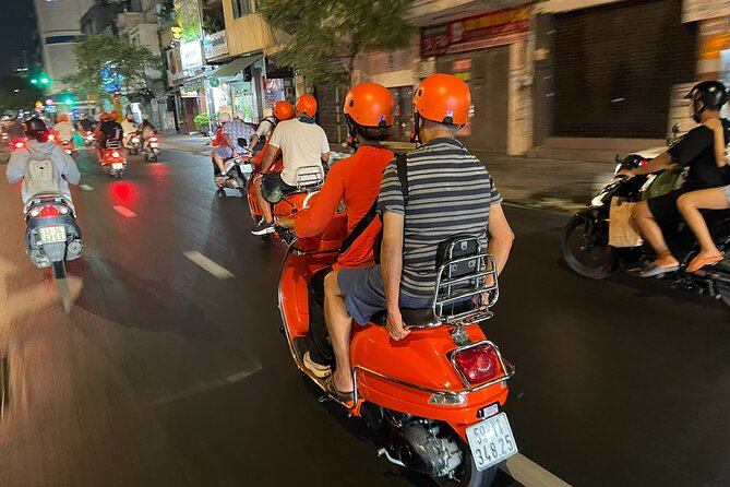 Vespa Female Ao Dai riders Night Street Food + See Train Street - Hanoi Opera House stop: nighttime architecture plus banh xeo
