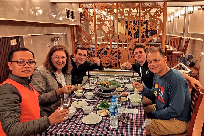Vespa Food Tour Hanoi After Dark 3.5 hrs_TOP SERVICE, MAX VALUE - Stop 2: Cảm Tử Monument to Hàng Bè Market in the Old Quarter
