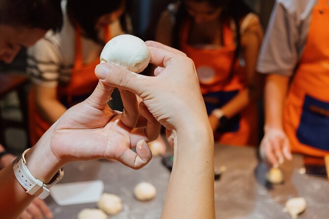 Vietnamese Bread & Brew: Banh Mi Baking Class & Specialty Coffee - Assembling your sandwich and eating what you made